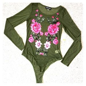 Brand new mesh bodysuit. Flower appliqué detail.